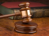 Лондонский суд приговорил экс-трейдера "Открытия" к 12 годам тюрьмы