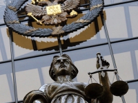 ФАС накажет юрфирму за сайт с символикой СКР и Верховного суда